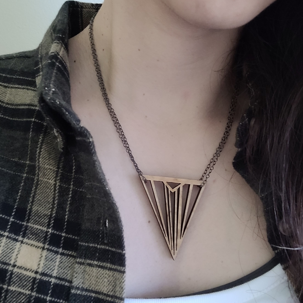 Artisan made laser cut wood necklace